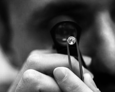 magnifying glass to check diamonds