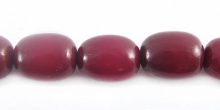 Buri seed oval 10x8mm dyed burgundy