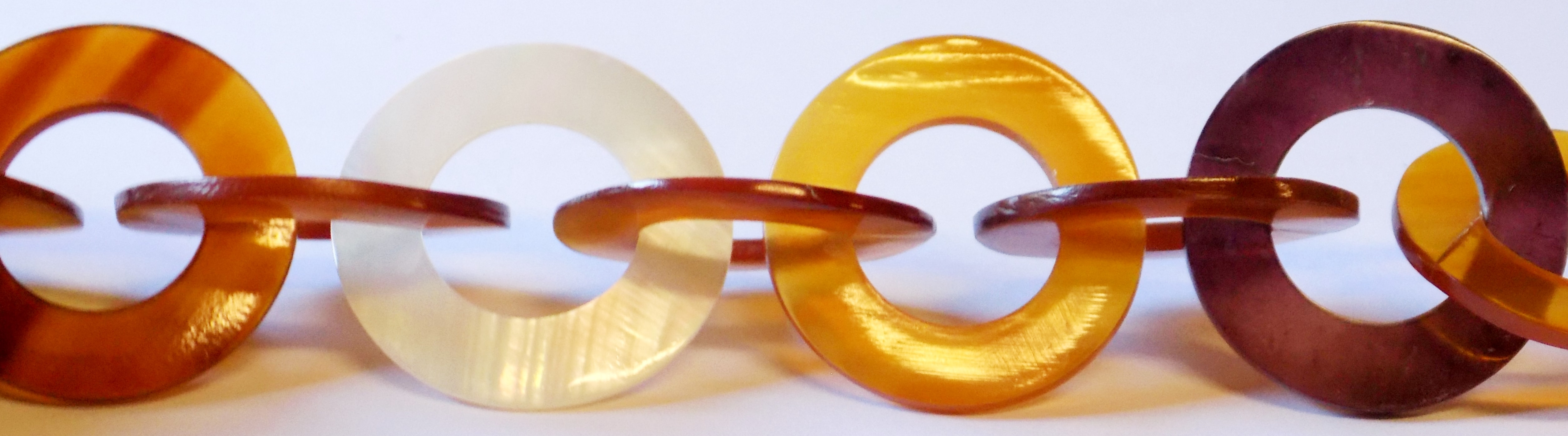 Makabibi golden horn ring beads